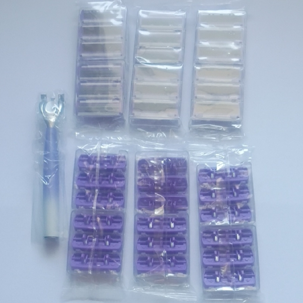 Purple and White Razors with Handle